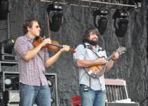 Jimmy De Martini and Clay Cook of The Zac Brown Band at the Bonnaroo Music Festival in 2010 (Photo copyright 2010 Devin Grant)