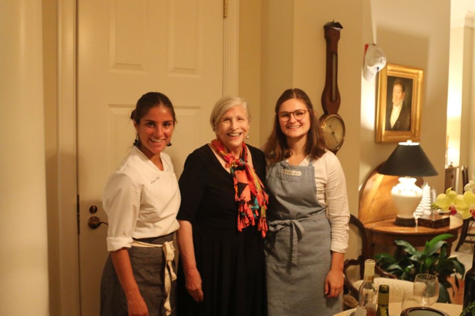Private Chef Lauren Furey, Charelston Grit's newest food writer, is standing with famed culinary icon, Nathalie Dupree inside a house.