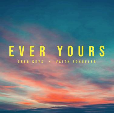This is the title of of the song Ever Yours with blue sky background written in yellow letters